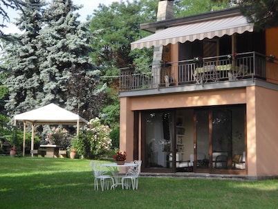 Elegant villa surrounded by a large garden available to guests