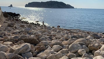Una spiaggia nelle vicinanze, teli da spiaggia