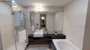 Shower, hair dryer, towels