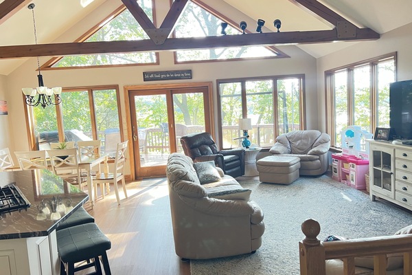 Spacious, room with lots great room windows and beautiful views