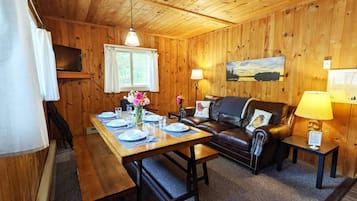 Cabana standard, 2 quartos, vista para o resort | Área de estar