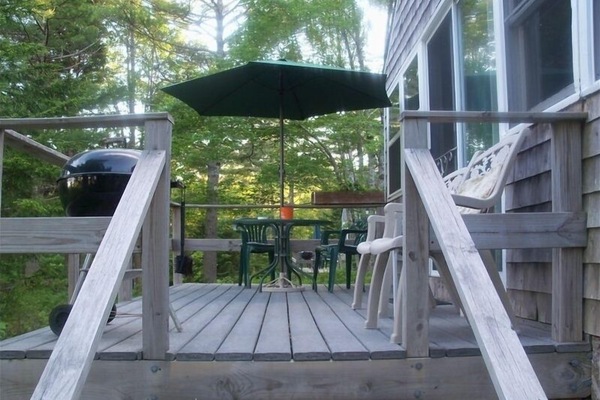 Deck with grill, umbrella table & chairs