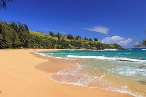 On the beach, sun loungers, beach towels - Relax & Unwind: Private Beachfront Escape with Stunning Views, Amazing Location (Anahola)