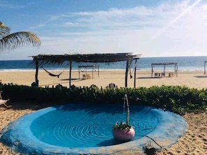 On the beach, free beach cabanas, sun loungers, beach massages