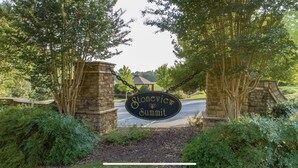 A stone archway with a sign reading "Stoneview Summit." - Lake Front, Walk out ground level, Sunset VIEW, Dedicated Slip, Awesome Pool (Dadeville)
