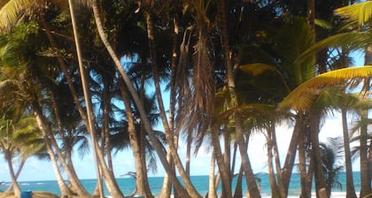Spacious 3 Bedroom Condo steps from beach