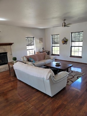 Smart TV, fireplace, books, offices