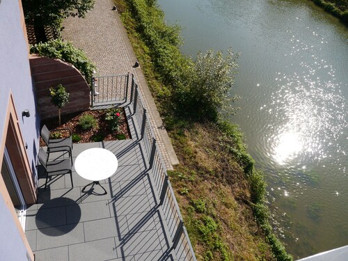 Fantastic apartments with a sun terrace directly on the shores Tauber