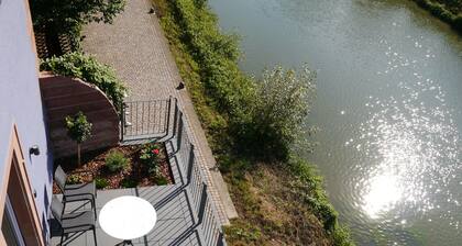 Fantastic apartments with a sun terrace directly on the shores Tauber