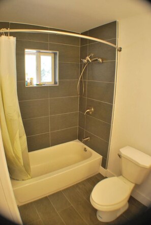 Baignoire, sèche-cheveux