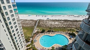 A hotel with a pool, beach, and ocean view. - Beach Colony West 15A- 3BD/3BA Gulf front w/Beach Service & Onsite Management (Navarre Beach)