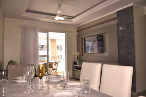 Enjoy meals for two in this stylish dining area with a view of the outside.