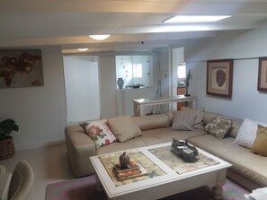 TV, fireplace, books, stereo - Beach on Antilles - Sandy Toes and Relaxation just steps away from your room (Gordons Bay Central)