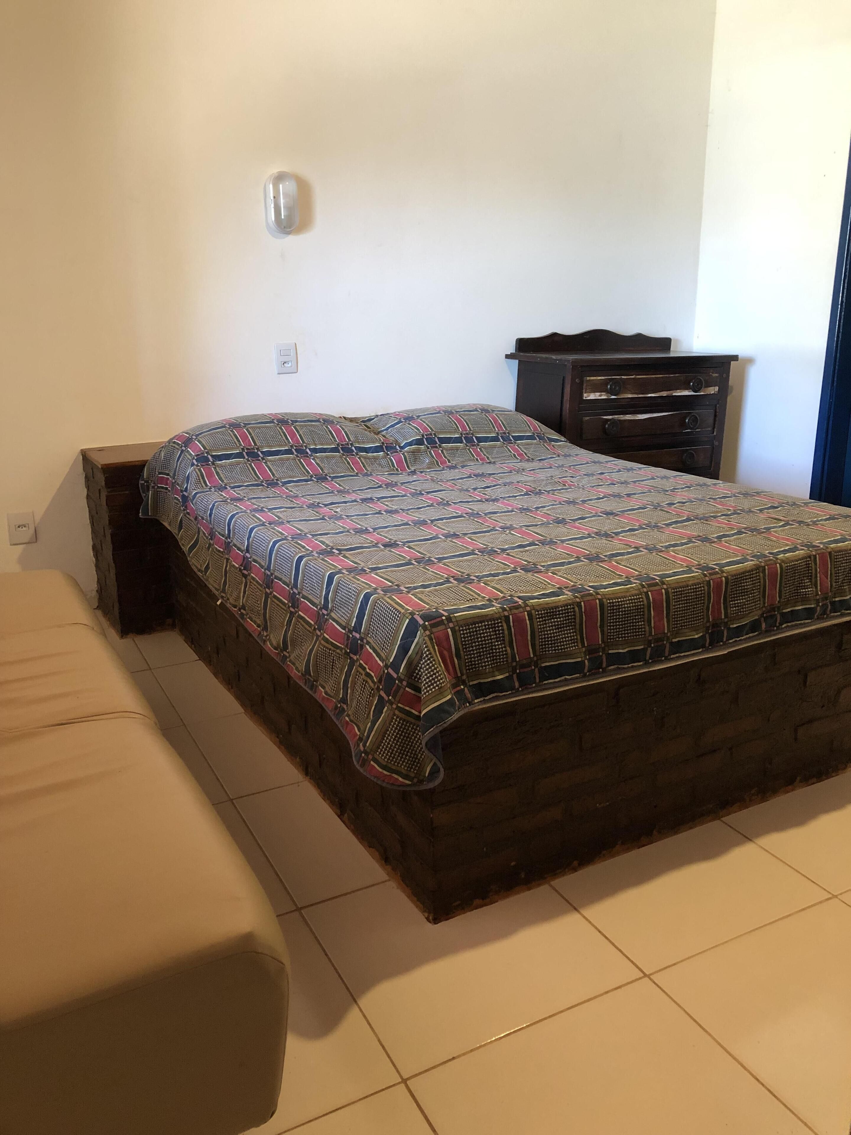 Rest, foot in the sand and tranquility