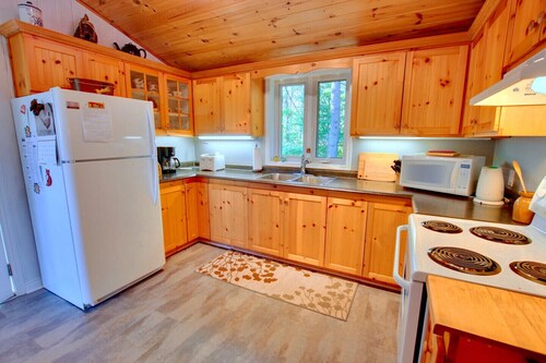 The Perch: chalet au bord du lac surélevé faisant face au sud.