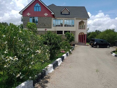 Kathy's Place ( see Lake Naivasha & Hills beyond)