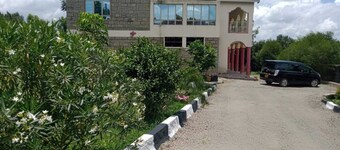 Kathy's Place ( see Lake Naivasha & Hills beyond)