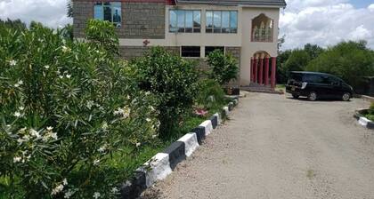 Kathy's Place ( see Lake Naivasha & Hills beyond)