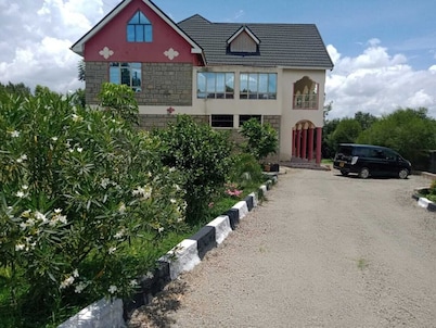 Kathy's Place ( see Lake Naivasha & Hills beyond)