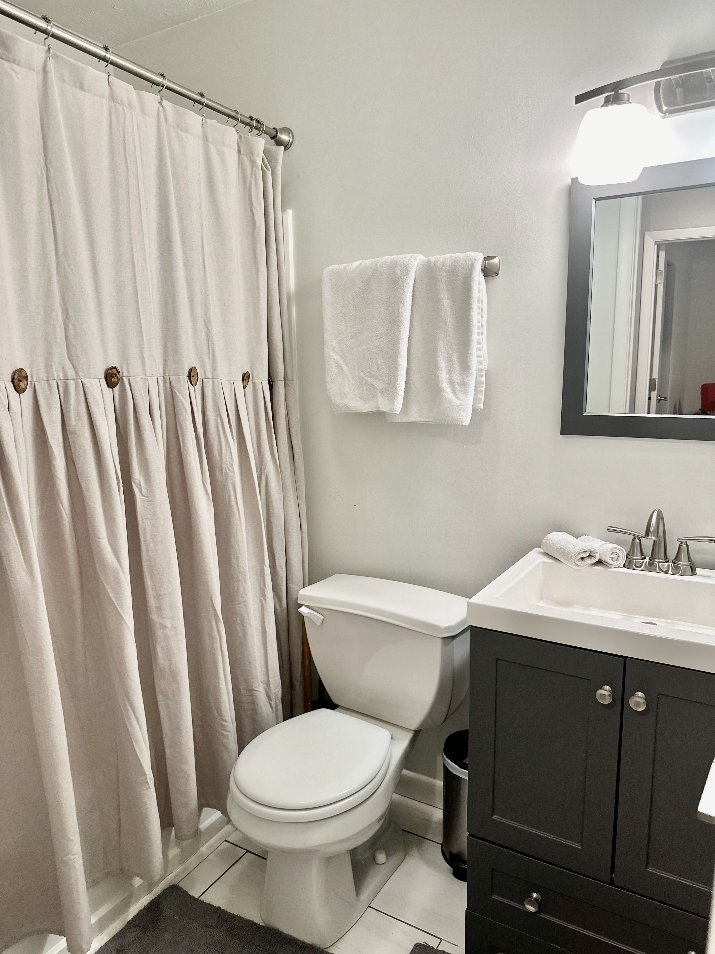 Shower, towels, soap, toilet paper