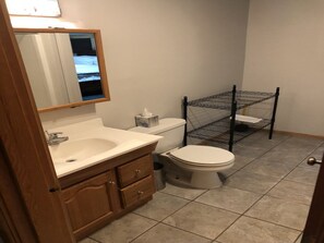 Combined shower/bathtub, hair dryer, bathrobes, towels