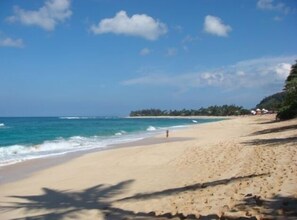 On the beach, sun-loungers, beach towels