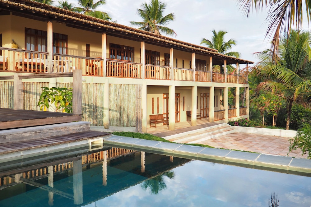 A fenced mansion with security cameras!
