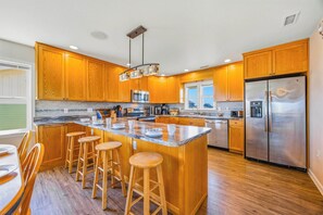 Fridge, microwave, oven, stovetop - Oceanfront Avon Home with Private Pool, Hot Tub, Deluxe Game Room, Tiki Bar (Avon)