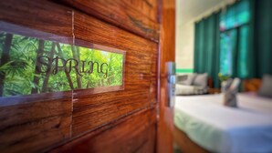 A wooden door with a sign that reads "SPRING". - White Summerville Tourist Inn (Busuanga)