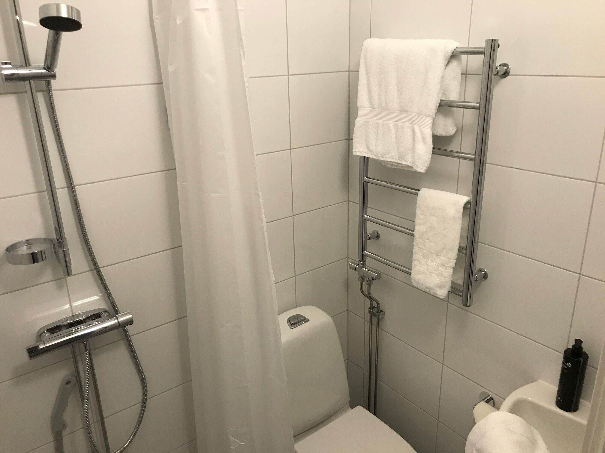 shower, eco-friendly toiletries, hair dryer, towels