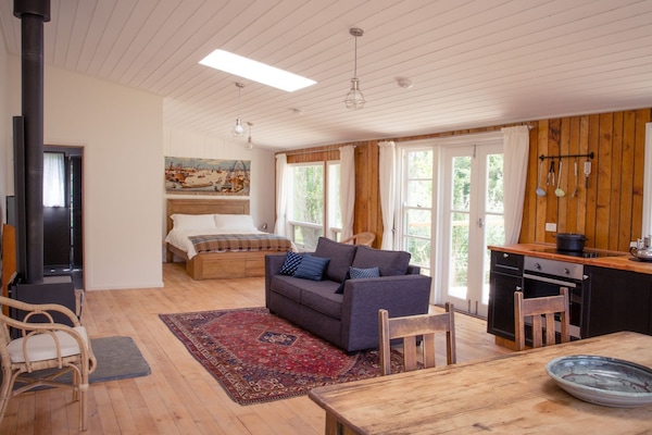 Accommodation interior from kitchen to 
bedroom nook