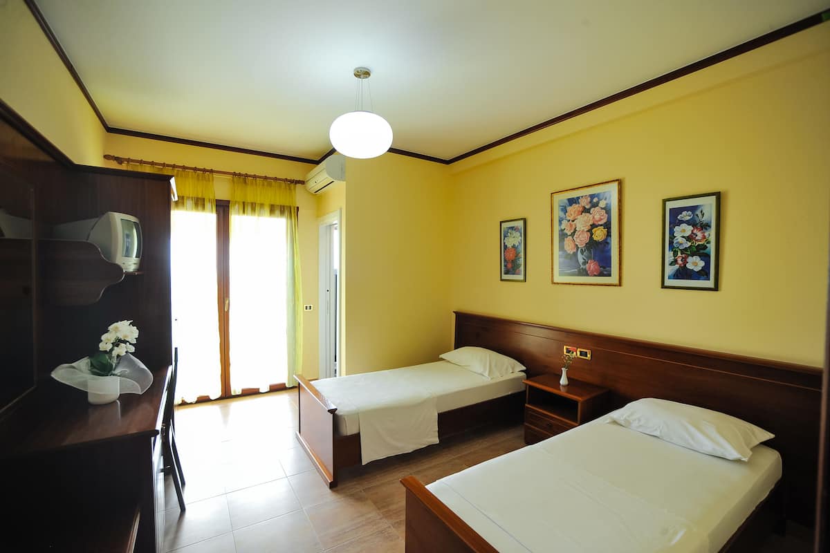 Standard Twin Room, 2 Twin Beds, Non Smoking, Sea View | Minibar, in-room safe, desk, laptop workspace