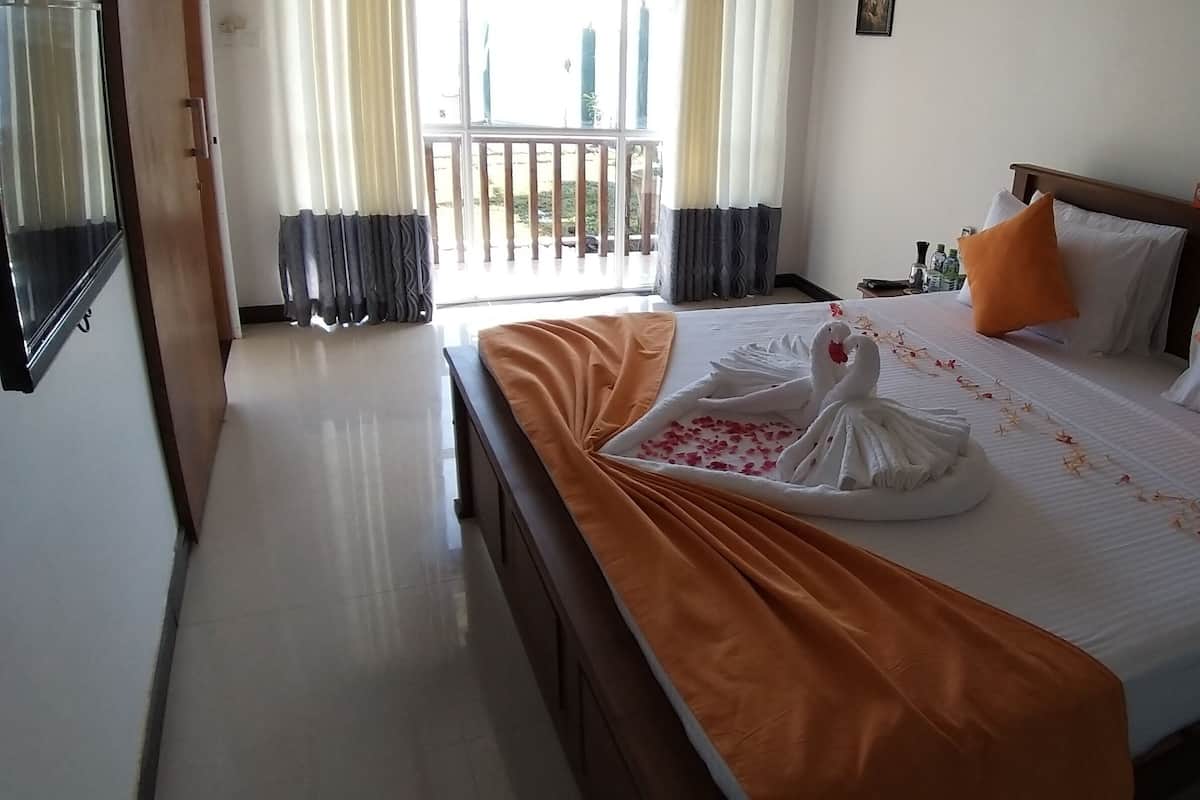 Habitación doble Deluxe de uso individual, 1 cama King size, para no fumadores, vista al océano | Wifi gratis y acceso para silla de ruedas