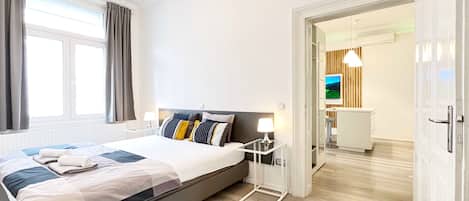 Appartement Deluxe, vue ville | Coin séjour