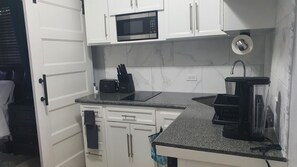 Standard Apartment | Private kitchen | Microwave, stovetop, coffee/tea maker, toaster - Kozy Bahamas Getaway (Nassau)