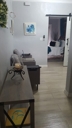 Standard Apartment | Living area | 55-inch flat-screen TV with digital channels, pay movies - Kozy Bahamas Getaway (Nassau)