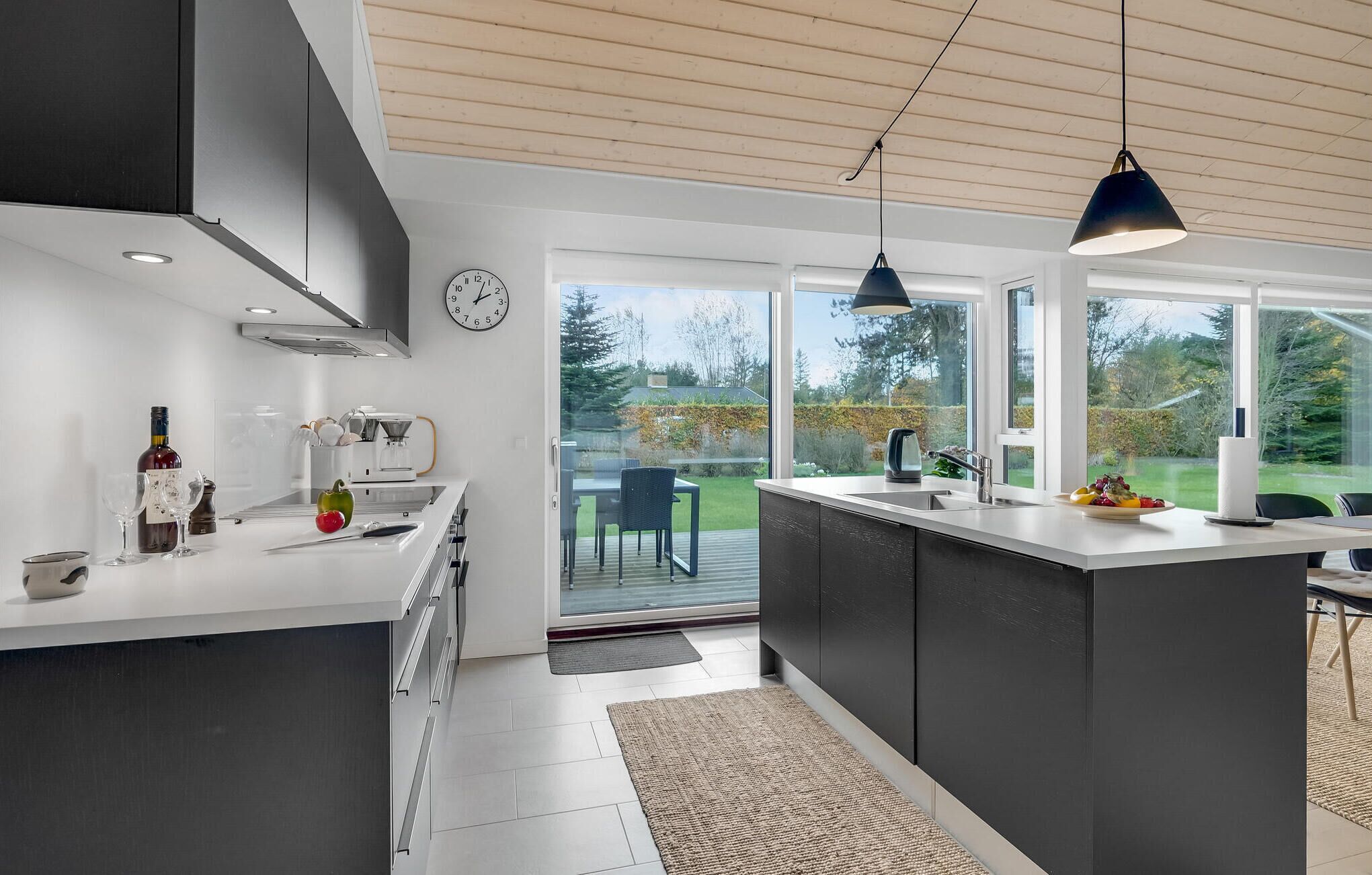 Fridge, stovetop, dishwasher, coffee/tea maker