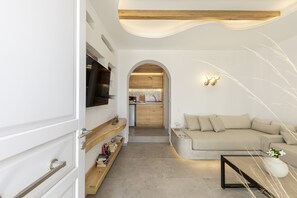 Junior Suite, Mountain View (Next to Caldera) | Living area | 43-inch flat-screen TV with satellite channels, Smart TV