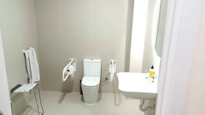 Shower, rainfall showerhead, hair dryer, towels