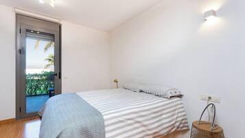 2 dormitorios, tabla de planchar con plancha, Internet y ropa de cama