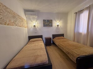 2 habitaciones, tabla de planchar con plancha y wifi gratis 