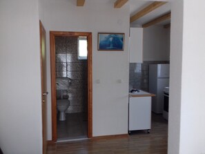 Panoramic Studio, 2 Double Beds, Non Smoking, Lake View | Bathroom | Shower, slippers, towels