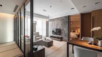 Down comforters, free minibar, in-room safe, desk