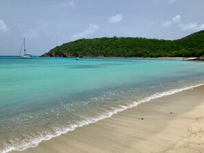 On the beach, sun loungers, beach towels