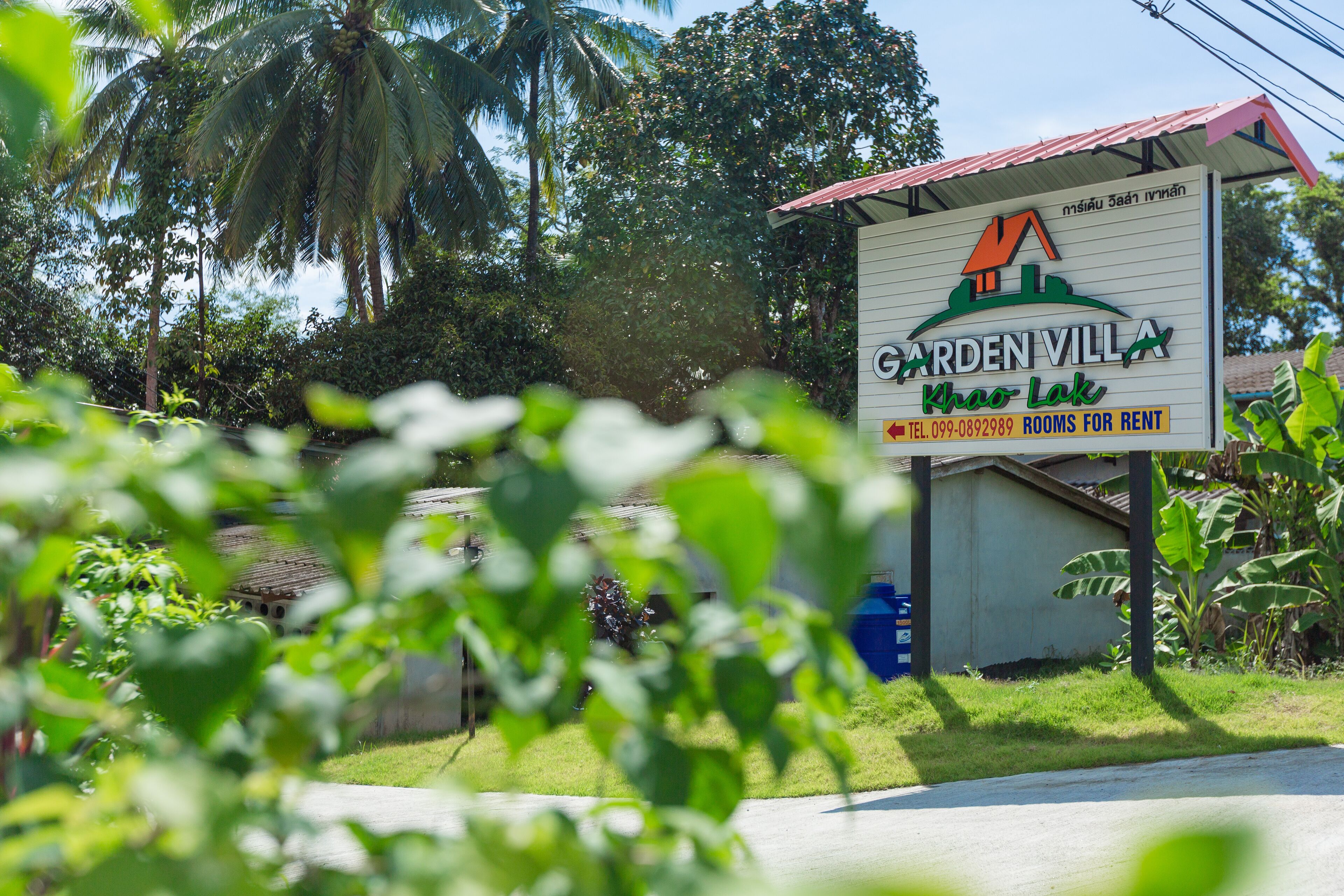 A sign for Garden Villa Khao Lak, indicating it is available for rent.