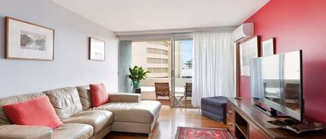 Apartment, 1 Bedroom | Living area | Flat-screen TV