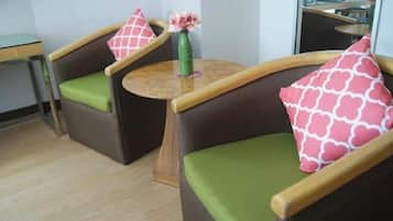 Desk, blackout drapes, iron/ironing board, bed sheets