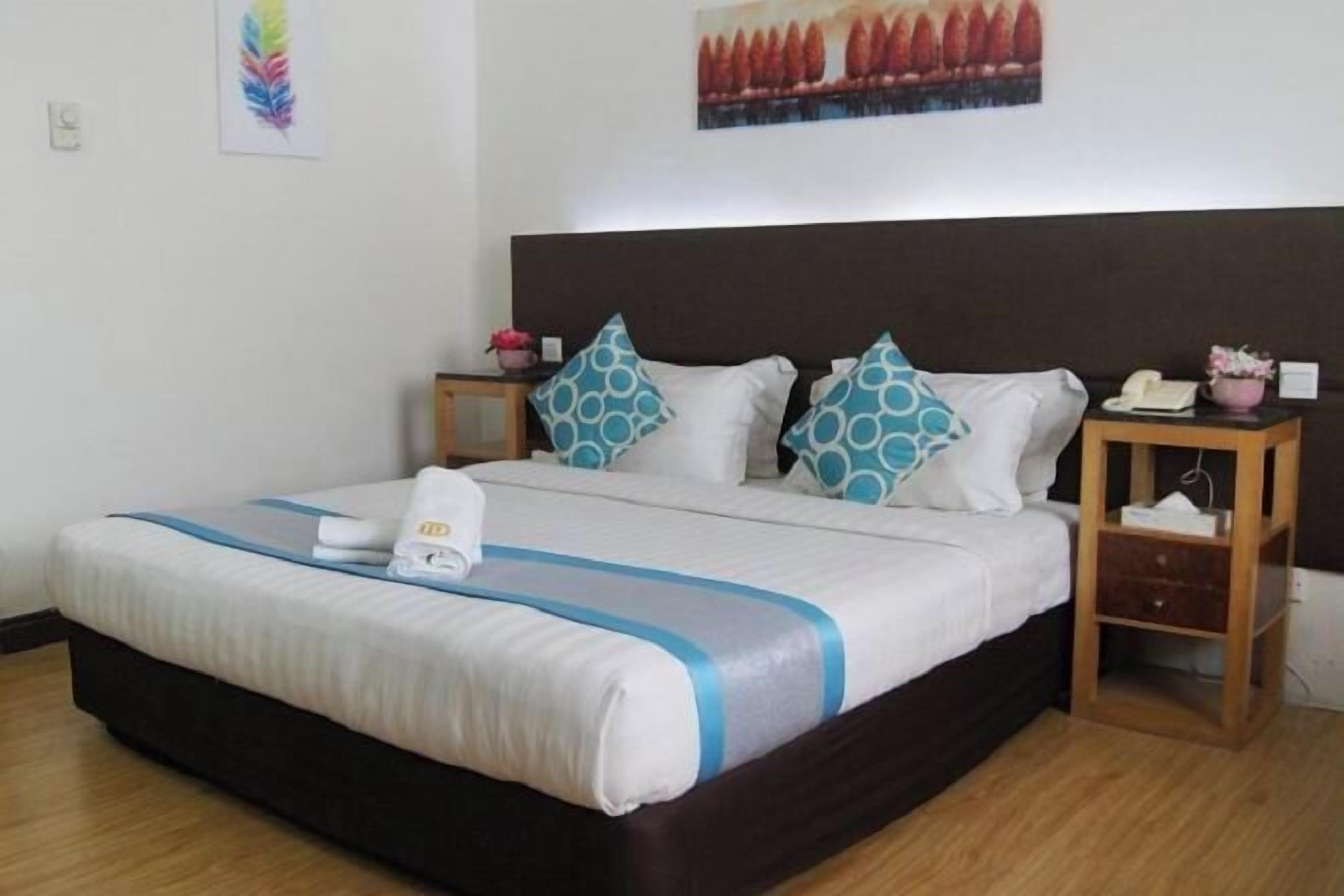 Desk, blackout curtains, iron/ironing board, bed sheets