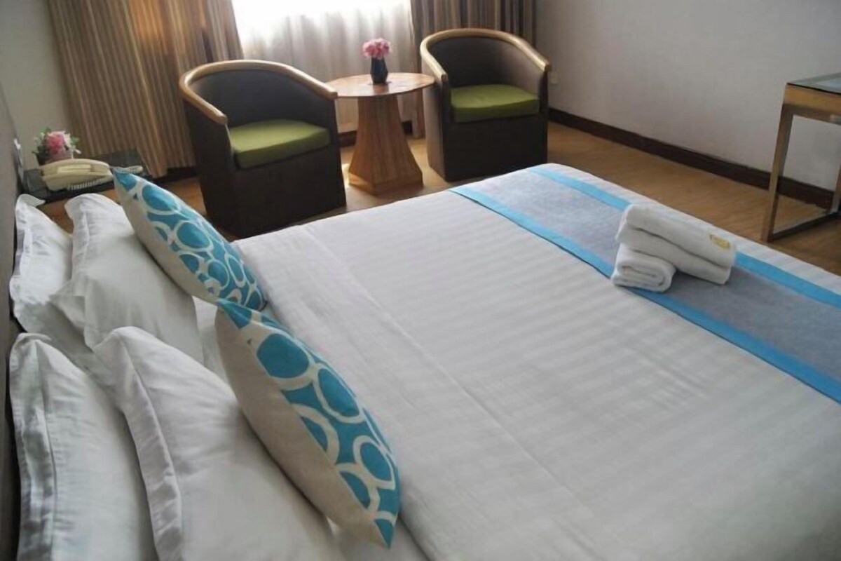 Desk, blackout drapes, iron/ironing board (on request), bed sheets