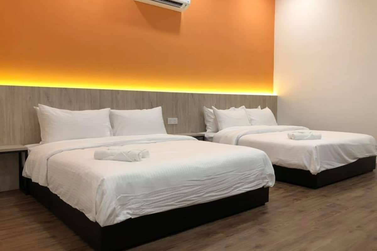 deluxe room, 2 queen beds, non smoking | desk, iron/ironing board, free wifi